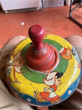 Vintage Made in USA Lithographed Tin Spinning Top Wooden Handle Skating Children